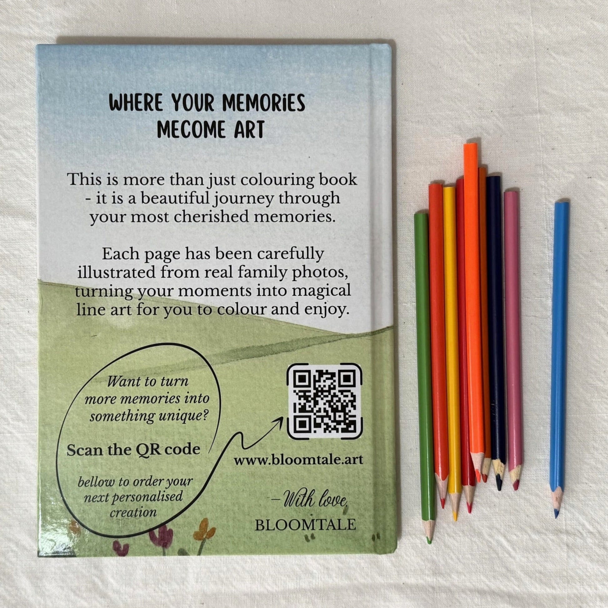 Back cover of the personalised colouring book by Bloomtale, featuring coloured pencils, QR code, and the message "Where your memories become art".