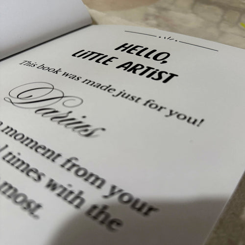 Personalised dedication page inside "Colour My Memories" colouring book — greeting the child with a heartfelt message and their name. A touching start to a one-of-a-kind keepsake from Bloomtale.